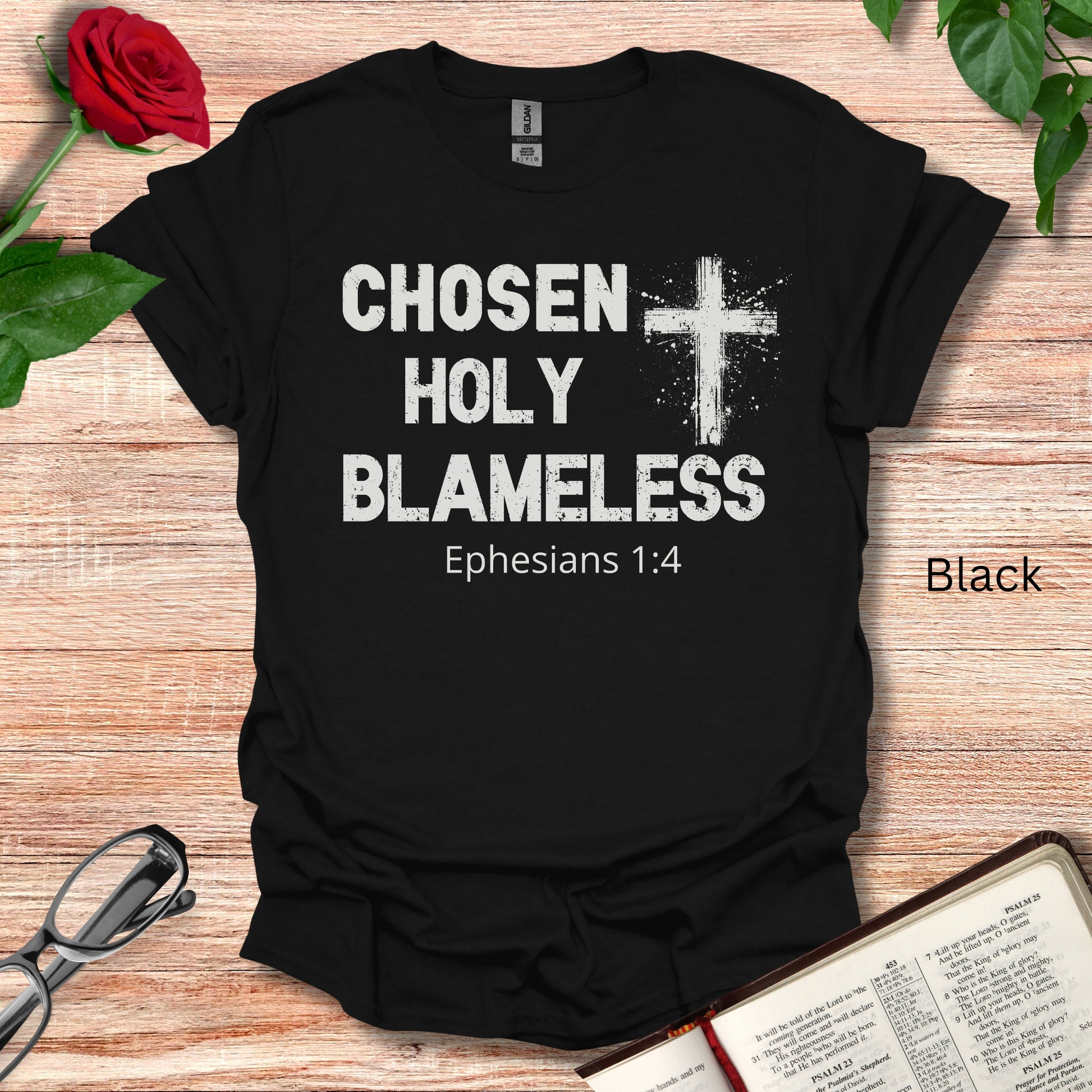 This is a Jesus t-shirt that says Chosen Holy Blameless with a Christian Cross and notes Ephesians 1:4. 