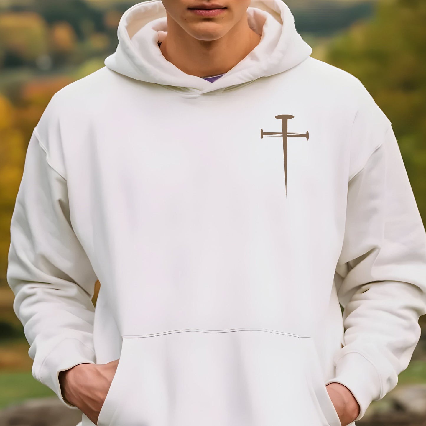 A Christian hoodie with a cross on the front and a Lion of Judah Graphic on back noting Revelation 5:5.