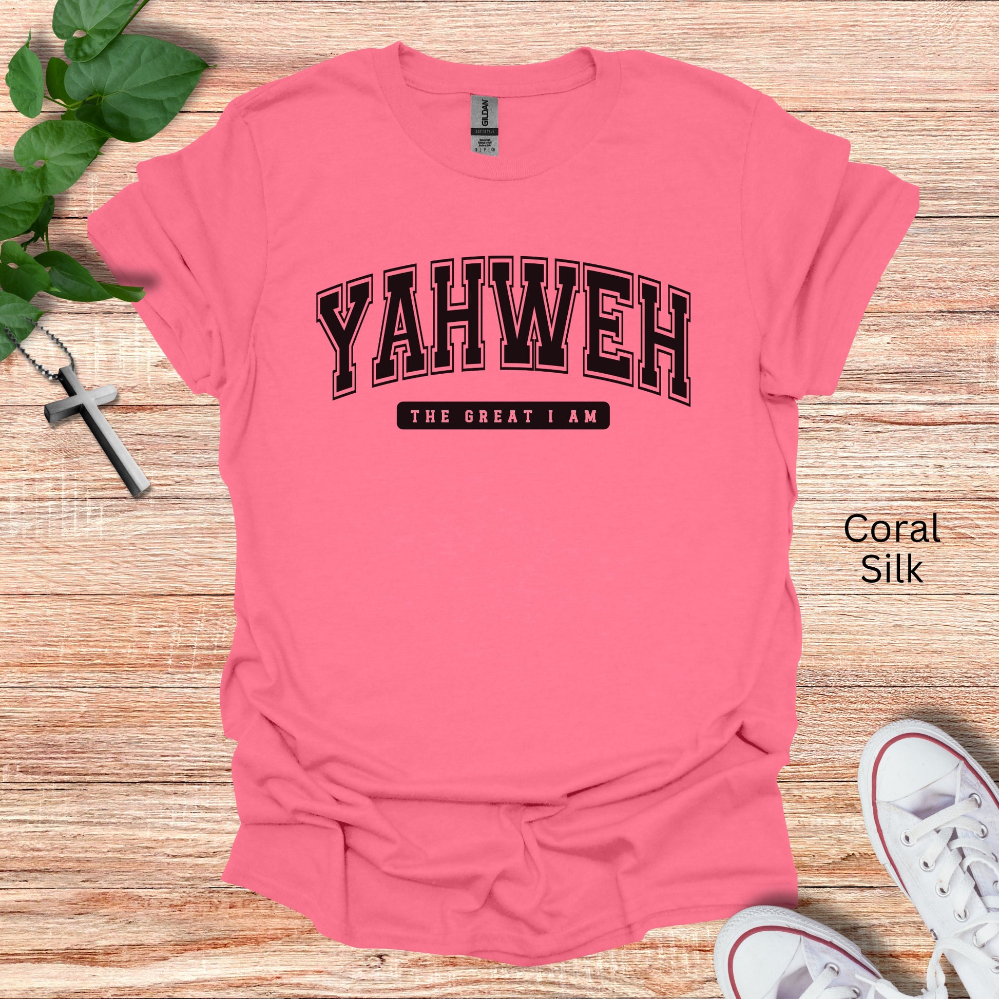 This lovely coral silk colored tshirt will be a great gift for any Christian friend, family member or oneself. YEHWEH is spelled out in a curved college font with "The Great I AM" listed underneath.