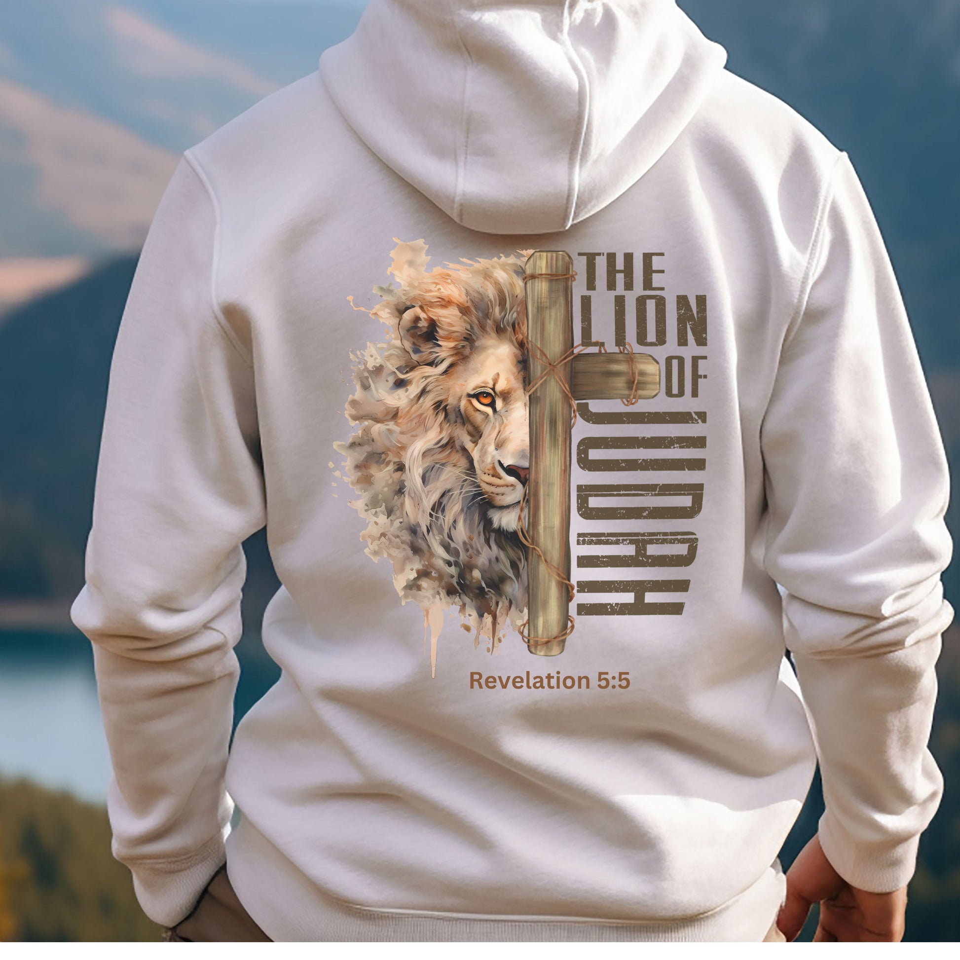 A Jesus hoodie with a Lion of Judah with a wooden cross graphic Rev 5:5 on back and a cross made of spikes on front. 