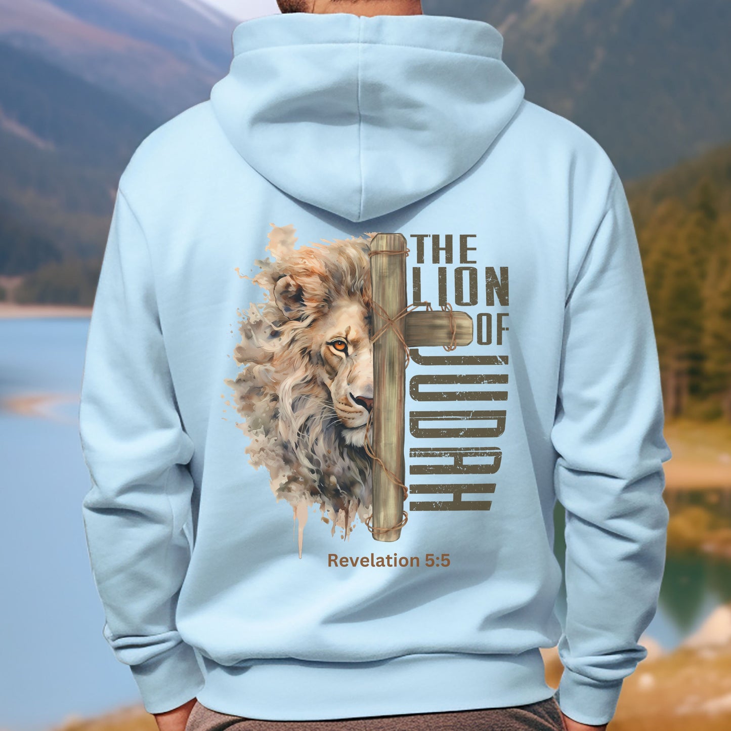 Light blue Jesus Hoodie with the Lion of Judah on back Revelation 5:5 and cross made of spikes on the front.