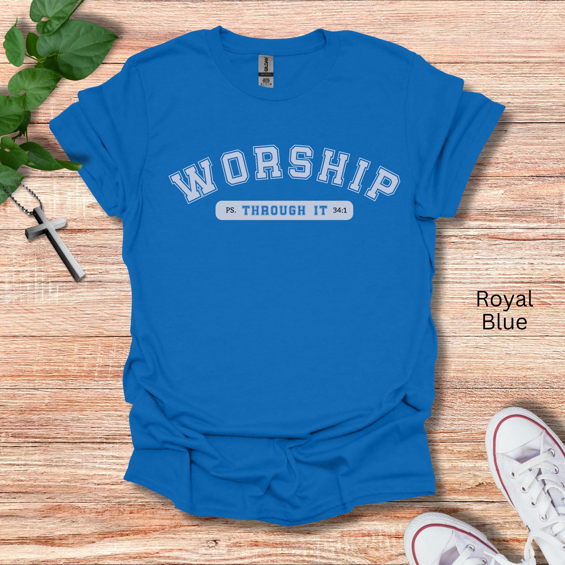 Worship t-shirt gift for her shown in royal blue. The text says Worship Through It and Psalms 34:1 is noted below.